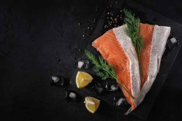 Sliced Fresh Raw Salmon Lying Stone Cutting Board Lemon Wedges — Stock Photo, Image