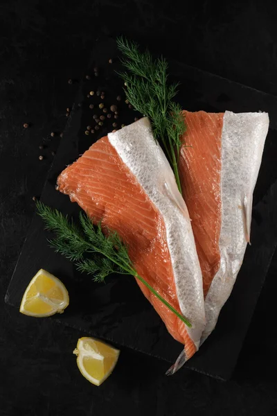 Sliced Fresh Raw Salmon Lying Stone Cutting Board Lemon Wedges — Stock Photo, Image
