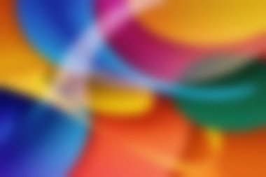 Soyut arkaplan, harmanlanmış renkli şekiller ve dondurulmuş, bulanık bir doku. Ayrıntıları temizle...