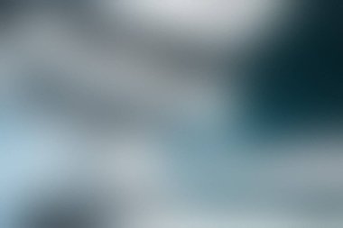 Mavi, gri ve koyu deniz mavisi renklerinin karışımı ile soyut yumuşak odak arkaplanı. Ayrıntıları temizle ...