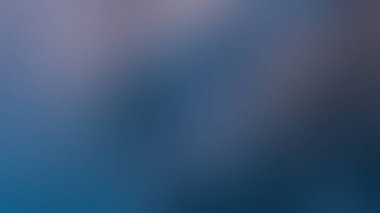 Yumuşak bulanık efektli koyu mavi ve gri bir arkaplan. Ayrıntıları ve canlı rengi temizle...