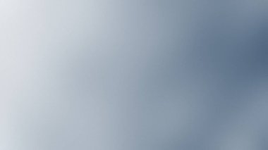 Hafif bir ışık efektiyle açık mavi-gri bir eğim daha koyu bir tonda kayboluyor. Ayrıntıları temizle ...