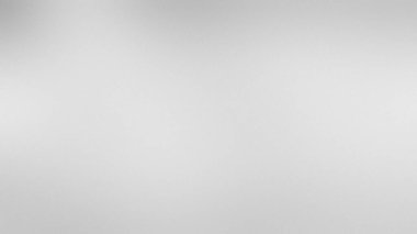 İnce desenli ve yumuşak yayılmış ışıklandırması olan düz açık gri bir arkaplan.