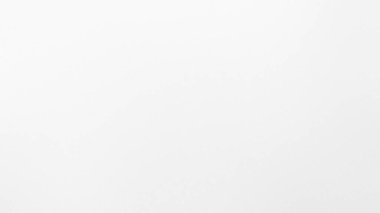 İnce bir dokusu ve ince bir tahılı olan sade beyaz bir arka plan. Açık detaylar ve canlı eş...