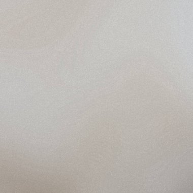 Tarafsız, gri bir arka plan ve ince bir tahıl dokusu var. Yumuşak ve ince bir öneride bulunuyor....