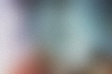 Benekli dokusu ve ılık turuncu ve mavi tonlarıyla bulanık arkaplan.