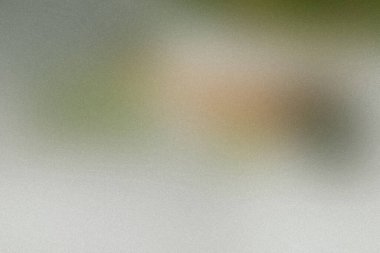 Bulanık, soyut bir arkaplan. Yeşil ve bej renkler arasında yumuşak geçişler var....