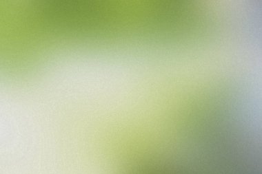 Açık yeşil ve beyaz tonlara ve ince tahıl dokusuna sahip yumuşak odak arkaplanı.