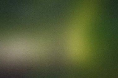 Yeşil ve sarı renkleri ve ince tahıl dokusuyla soyut yumuşak odak arkaplanı.