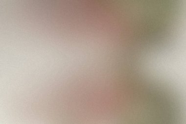 Yumuşak pembemsi bej ve yeşil bulanık arkaplan ince bir tahıl dokusuna sahip..