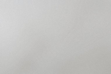 Hafif kumlu dokusu ve yumuşak odaklı açık gri bir arkaplan. Ayrıntıları temizle ve v...