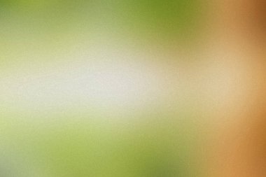 Yeşil, bej, turuncu renkler ve ince bir dokuya sahip sıcak ve soyut bir arka plan..