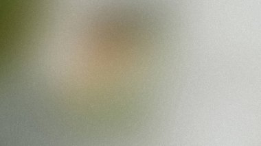 Yumuşak yeşil ve bej tonlarıyla bulanık bir arka plan ve ince bir kumlu doku. Ayrıntıları temizle...