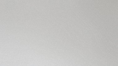 Tarafsız gri bir arka plan, ince bir tahıl dokusu ve yumuşak yayılmış ışıklandırmayla. Ayrıntıları temizle...