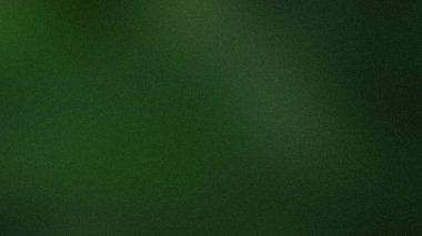 İnce bir tahıl dokusu ve yumuşak gölge bölgeleri olan koyu yeşil bir arkaplan..