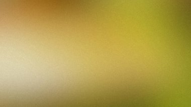 İnce taneli dokusu ve yumuşak ışığı olan altın sarısı ve yeşil eğimli bir arkaplan..