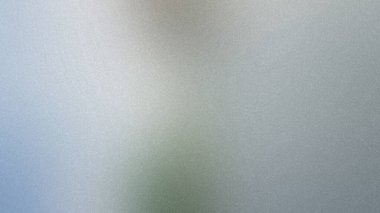 Hafif tahıl dokusu ve yumuşak ışıkla açık gri ve mavi bir arkaplan..