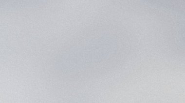 Açık gri desenli arka plan, ince taneli ve dağınık ışık, temiz bir görünüm yaratıyor..