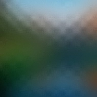 Bulanık yeşil ve mavi manzaralı soyut buzlu cam dokusu. Net detaylar ve canlı...