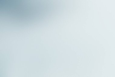 Hafif çapraz desenli bir kaplamayla açık mavi bir arkaplan. Ayrıntıları ve titreşimi temizle...