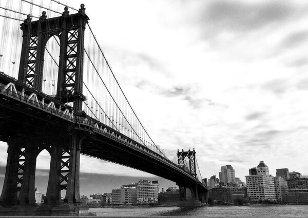 Manhattan bridge and the city in black and white style, New York
