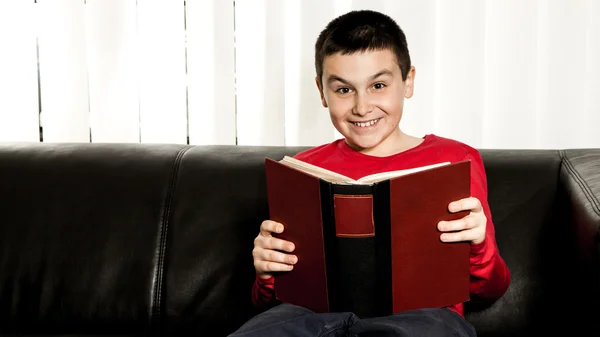 Happy boy smiling and holding a boy — Stock Photo, Image