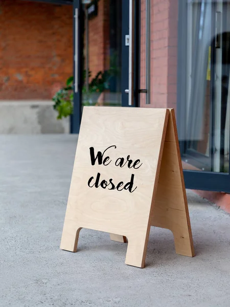 Shop closed due to Covid-19 outbreak lockdown. Temporarily closed sign for coronavirus in a small business activity due to quarantine measures in public places and restaurant. We are closed sign board