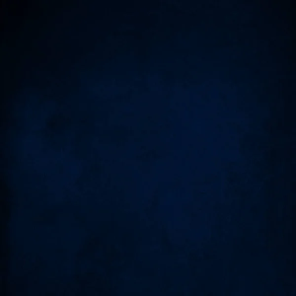 Texture for artwork and photography. Abstract royal blue stained paper texture background or backdrop.