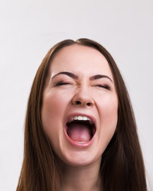 Emotion series of young and beautiful ukrainian girl - loud screaming