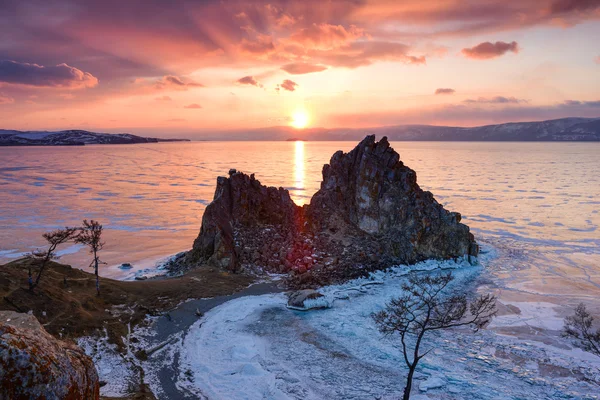 Sunset above frozen surface of the lake Baikal — Stock Photo, Image