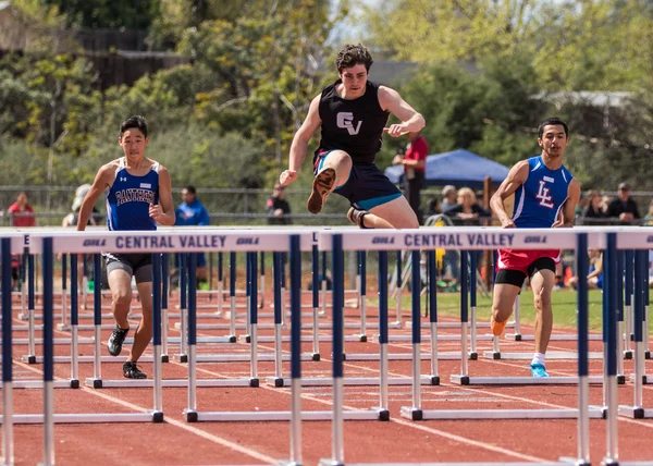 Hurdlers Race at the Meet — Stock Photo, Image