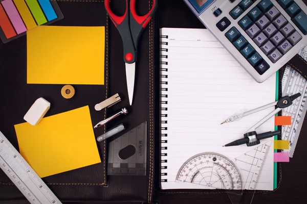 Office table desk with set of Office Stationery or Math Supplies.