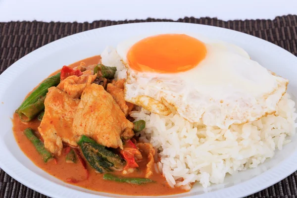 Fried pork curry, Stir fried pork and red curry paste with sunny side up egg. — Stock Photo, Image