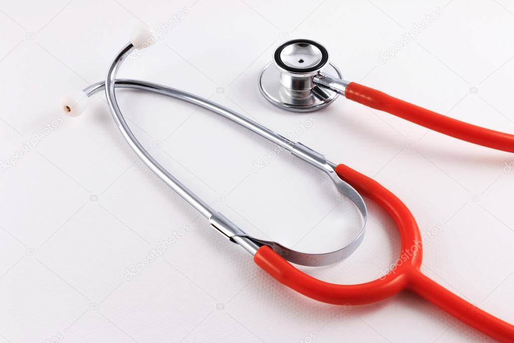Stethoscope with red tube on a white background with copy space around products.