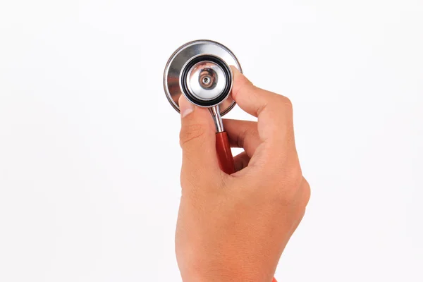 Medical equipment, Hand holding a stethoscope isolated on white background. Royalty Free Stock Images