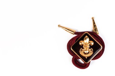 Vintage boy scouts badge isolated on white background.