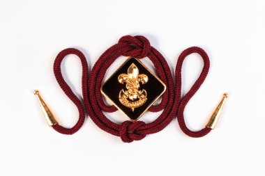 Vintage boy scouts badge isolated on white background.