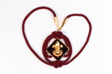 Vintage boy scouts badge isolated on white background.