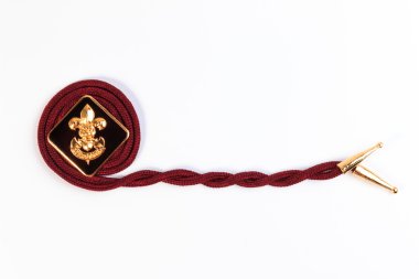 Vintage boy scouts badge isolated on white background.