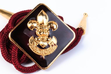 Vintage boy scouts badge isolated on white background.