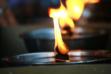 Oil lamp in the Buddhism temple in Thailand
