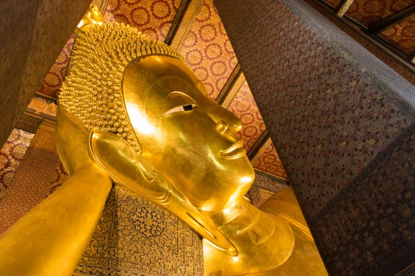The Golden Giant Reclining Buddha (Sleep Buddha) in Wat Pho Buddhist Temple, Bangkok, Thailand