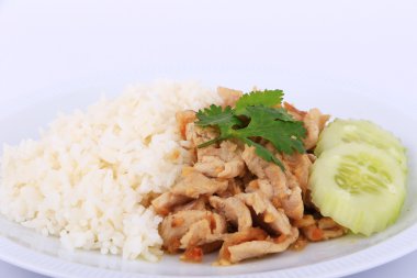 Tayland en sevdiğim yemek, kızarmış pirinç ve salatalık ile Sarımsak soslu domuz eti dilimlenmiş.