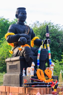Statue of King Naresuan in Thammikarat Temple in Ayutthaya, Thailand clipart