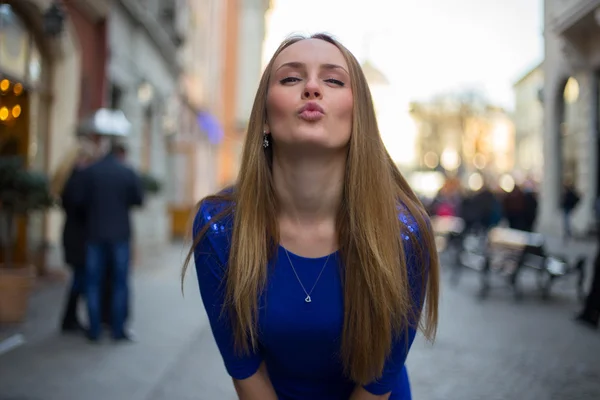 Kissing blonde girl — Stock Photo, Image