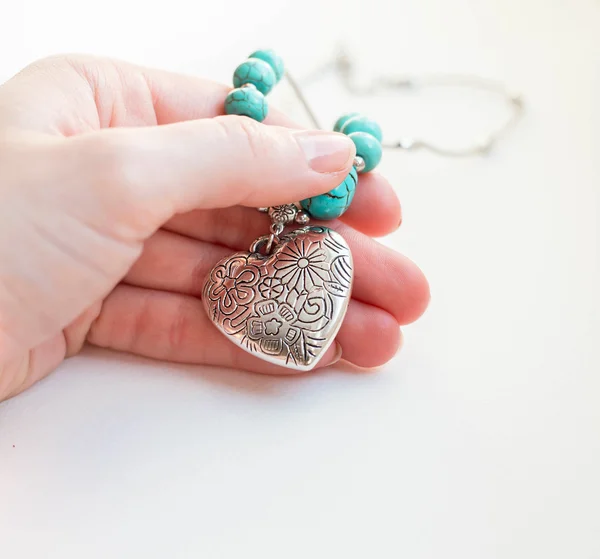 Silver heart with turquoise beads — Stock Photo, Image