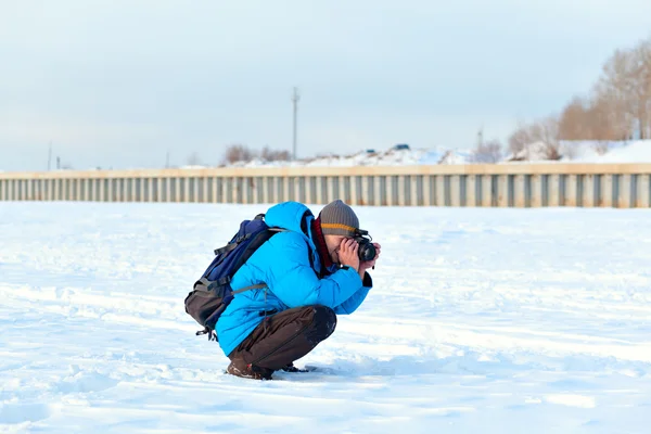 Photographer man in a winter season — Stock Photo, Image