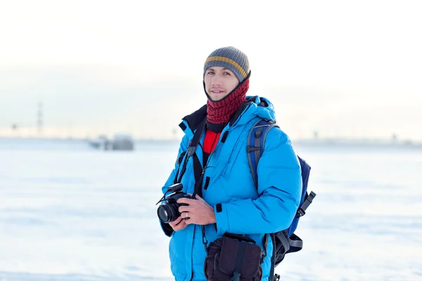 Professional photographer outdoor in winter — Stock Photo, Image