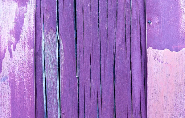 Paars en violet houten rustieke achtergrond of geschilderde houten planken textuur. De frame en kopie ruimte. Scheuren en spleten op het oppervlak van de multiplex. — Stockfoto