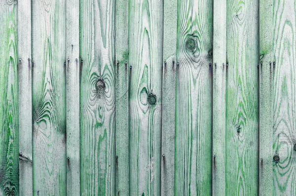 Un fragment de clôture en bois. Planches en bois comme arrière-plan avec espace de copie. Bois rustique panneaux de bois texture de fond couleur verte . — Photo